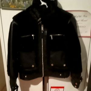 Maniere De Voir Black faux fur Biker/ Aviator coat with silver detailing.